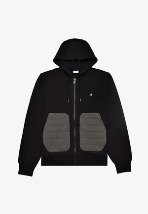 Schwarzer Kapuzenpullover mit vollem Reißverschluss, ausgestattet mit großen grauen Stepptaschen. Weicher Stoff, verstellbare Zugkordel an der Kapuze und minimales Branding auf der Brust.