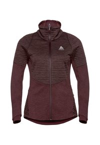 Maroon athletic jacket with a textured chest panel, high collar, full zip, and long sleeves, featuring a smooth fabric and logo detail.