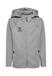 Lysegrå hættetrøje lavet af blødt, elastisk stof. Har en fuld lynlås, sidelommer og sort logo på brystet og skuldrene.