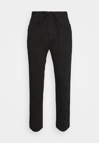Pantalons noirs légers avec une taille élastique et un cordon de serrage, présentant un design à jambe droite et sans motifs ni accessoires visibles.