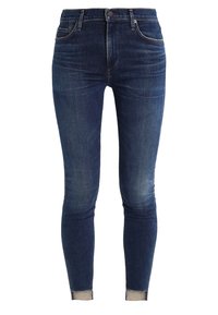Mörkblå skinny jeans i denim, med en klassisk femficksdesign, en liten frontmyntficka och fransiga detaljer vid fållen.