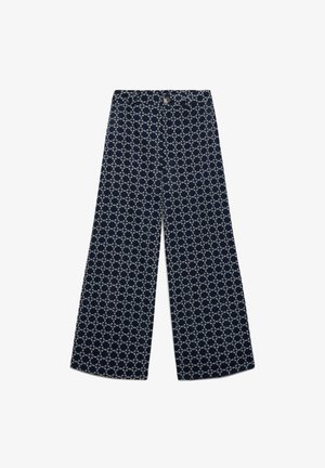 Pantaloni blu navy a gamba larga con motivo bianco di anelli interconnessi, chiusura con bottoni e passanti per cintura in vita, mostrati distesi su sfondo bianco.