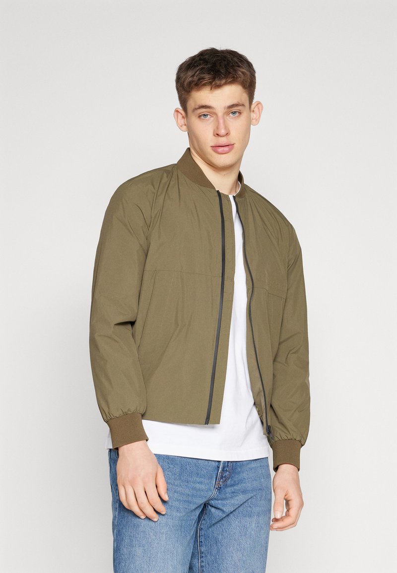 Tommy Hilfiger PORTLAND Bomber Jacket army green/olive Zalando