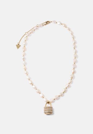 Pearl necklace with small gold beads and a gold padlock pendant encrusted with clear crystals on a white background.