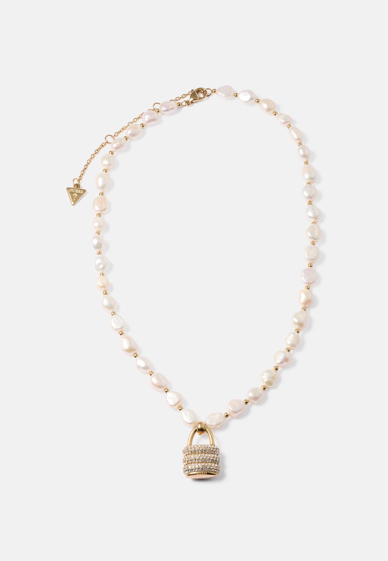 Pearl necklace with small gold beads and a gold padlock pendant encrusted with clear crystals on a white background.