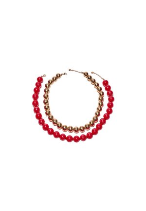 To perlearmbånd, det ene med skinnende gyldne kugler, det andet med blanke røde kugler, begge med lås på en hvid baggrund.