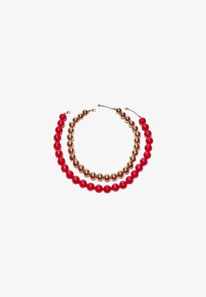 To perlearmbånd, det ene med skinnende gyldne kugler, det andet med blanke røde kugler, begge med lås på en hvid baggrund.