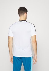 Nike Performance TOP  - Camiseta deportiva - white/black/bright crimson