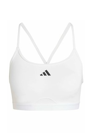 Top sportivo bianco con spalline sottili incrociate e scollatura rotonda. Logo nero sul davanti. Tessuto liscio con banda elastica sul fondo.