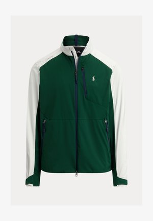 Jachetă softshell verde și albă cu fermoar, guler înalt, buzunare cu fermoar pe piept și lateral, și logo Polo Ralph Lauren pe pieptul stâng.