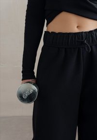 Champion EMOTIONAL DANCE WIDE LEG PANTS - Treniņtērpa apakšdaļas - black