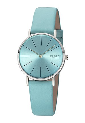 Montre ronde avec un cadran en métal bleu clair, marqueurs d'heure en argent et un bracelet en cuir turquoise doux. Le design minimaliste présente un boîtier fin en argent.