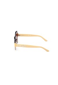 Gafas de sol redondas con lentes de color marrón, montura de plástico color crema y detalles dorados en las patillas con un logotipo.