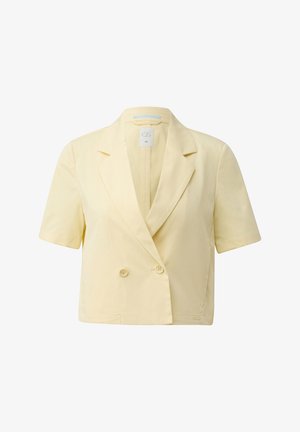 Blazer court jaune crème raccourci avec manches courtes, revers crantés et fermeture à double bouton.