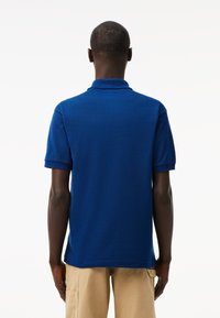 Lacoste Pikeepaita - bleu hbm