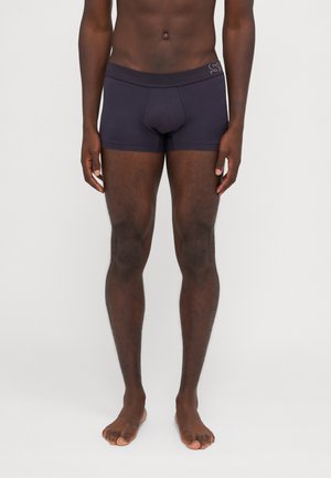 Dunkelmarineblaue Boxershorts aus glattem Stoff, mit enganpassendem Schnitt und einem weichen Bund mit dezentem Branding.
