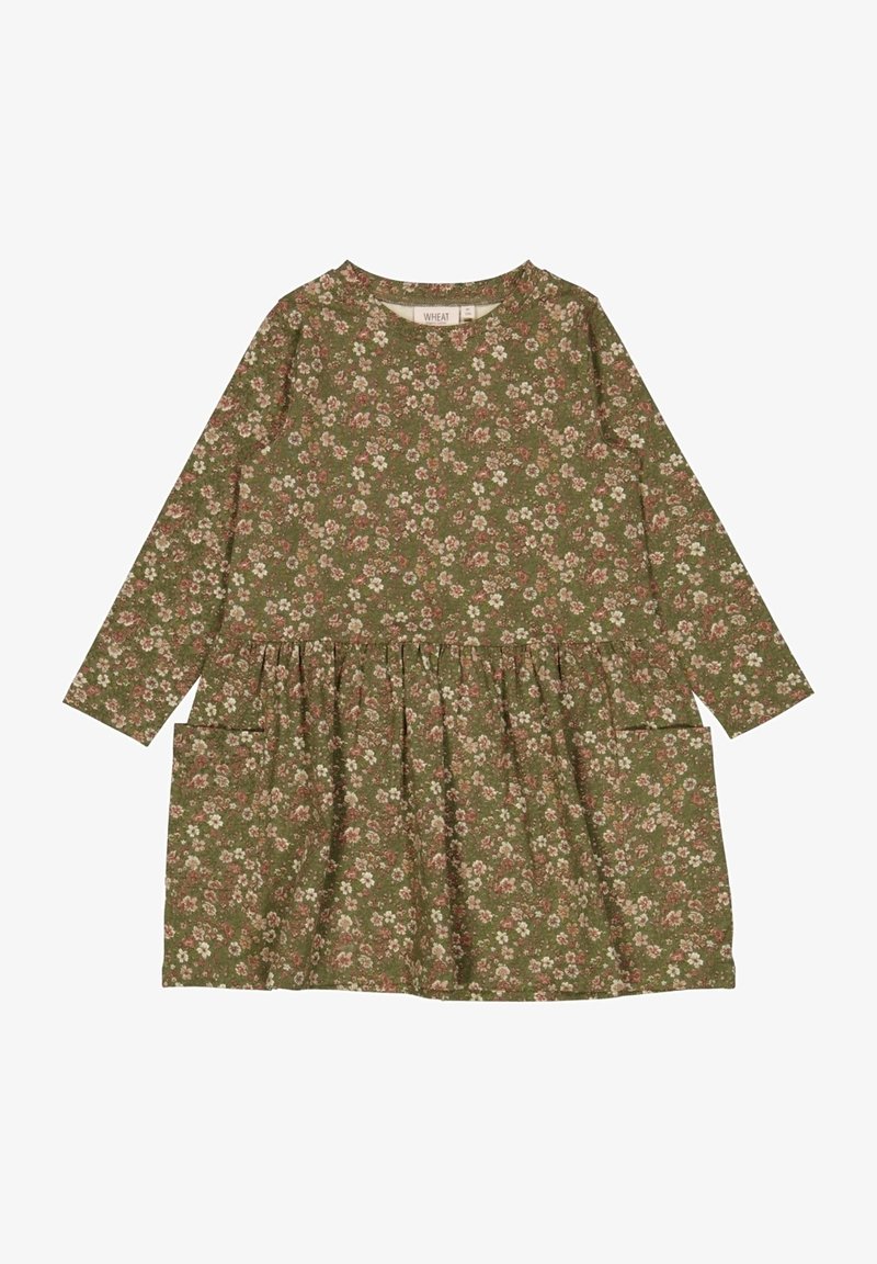 Robe florale verte à manches longues, avec une jupe froncée et deux poches latérales. Le tissu présente une finition douce et texturée.