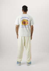 Nike Performance ICON PANT  - Træningsbukser - coconut milk/washed coral/black