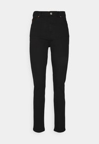 Calças de ganga pretas com cintura alta, ajuste slim, desbotamento subtil e design de cinco bolsos. Acabadas com um botão de metal e detalhes em costura laranja.