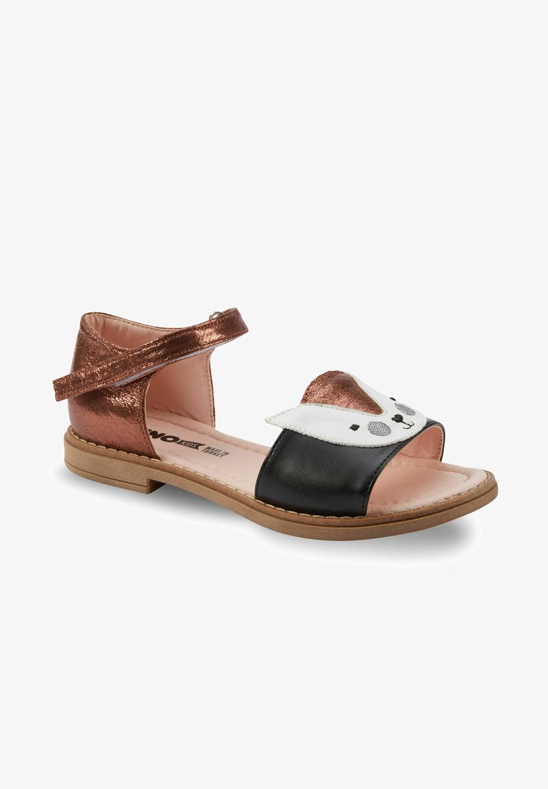 Mustat ja metallinhohtoinen ruusukultainen sandaali, jossa on avoin varvas, etuhihnassa kissan kasvokuvio ja tarranauha nilkkakiinnitys.