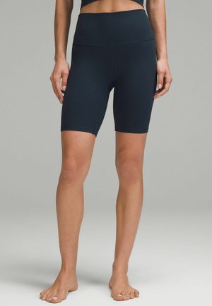 Mørkeblå cykelshorts med høj talje, lavet af strækstof, med en glat tekstur og tætsiddende silhuet, velegnet til aktivt brug.