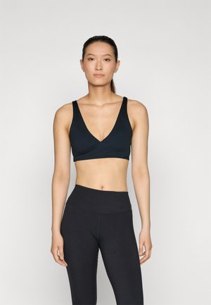 BRA CAPSULE - Light support sports bra - black/dark smoke grey