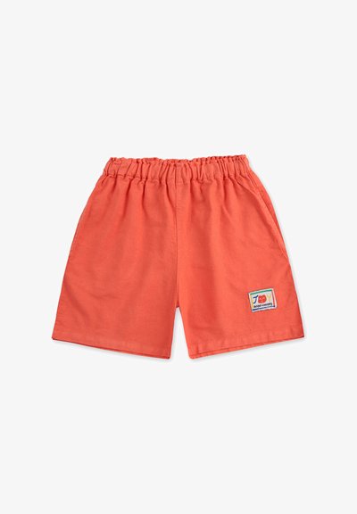 Korallenfarbene Baumwollshorts mit elastischem Bund und Seitentaschen. Merkmale ein Patch mit dem "Joy"-Logo auf der unteren rechten Seite.
