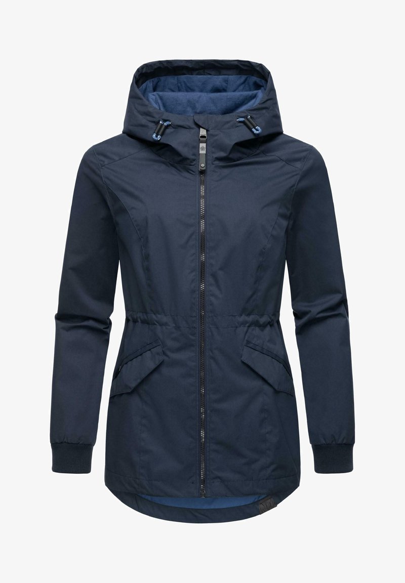 Tamsiai mėlyna, su gobtuvu, striukė su priekiniu užtrauktuku, elastingais rankovėmis ir šoninėmis kišenėmis. Pagaminta iš lygaus, vandeniui atsparaus audinio ir turi prigludusį siluetą.