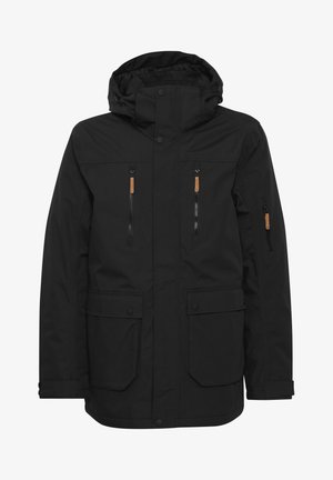 Juodas vandeniui atsparus parka su kapišonu, dviem užtrauktukais užsegamais krūtinės kišenėmis ir dviem snap uždarymo kišenėmis. Savybės - kontrastinės smėlio spalvos akcentai ant užtrauktukų.