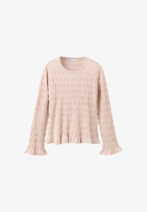 Blouse rose pâle à manches longues en tissu texturé, col rond et poignets ainsi que bas légèrement froncés.