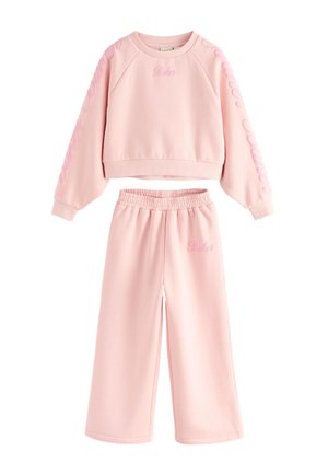 Soft pink sweat suit with long-sleeve cropped sweatshirt and wide-leg elastic waist pants, both featuring subtle matching embroidery.
