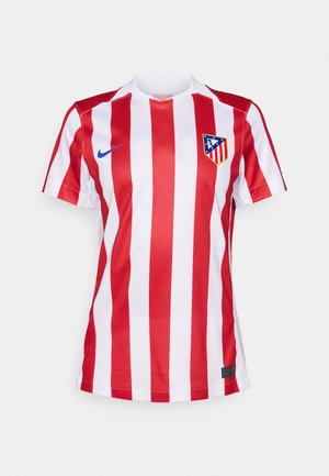 Rød og hvit stripete fotballdrakt med V-hals, med en blå Nike-logo og en klubbemblem på venstre bryst. Laget av pustende stoff.