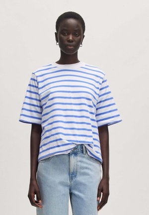 Blue and white striped cotton t-shirt with short sleeves, crew neck, relaxed fit, worn with light blue denim jeans.