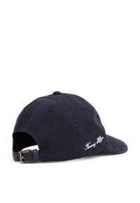 Casquette bleu marine en coton avec une visière courbée, sangle ajustable à l'arrière et logo de la marque brodé en blanc sur le côté.