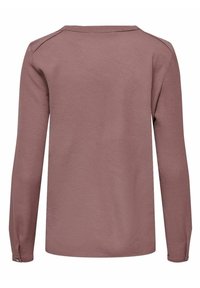 Chemise texturée mauve à manches longues avec col rond et poignets boutonnés, vue de dos sur fond blanc.
