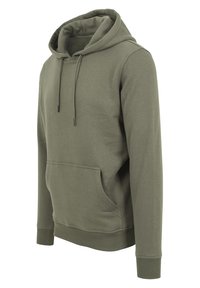 Olivno zelena jopa iz mehkega blaga, z sprednjim žepom, vrvicami, rebrastim robom in manšetami ter sproščenim krojem.