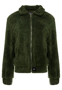 Groene, getextureerde fleecejas met kraag, ritssluiting aan de voorkant en elastische manchetten. Heeft een klein logo op de linkeronderkant aan de voorkant.