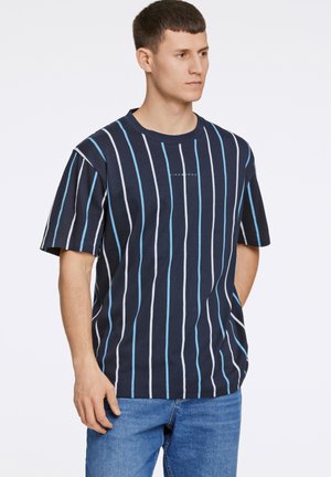 Navy striped T-shirt featuring vertical light blue and white stripes, short sleeves, and a relaxed fit. Cotton material with crew neck design.