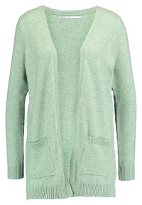 Světle zelený kardigan s výstřihem do V, otevřeným předním dílem, žebrovanými manžetami a dvěma předními kapsami. Měkký, strukturovaný pletený materiál.