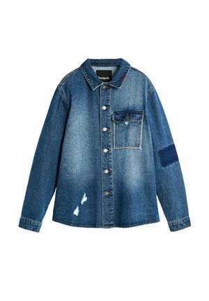 Teksast nööpidega jakk rinnatasku ja õrnalt kulunud pesuga, esiküljel kulumisjäljed ning paremal varrukal plaastri detail.