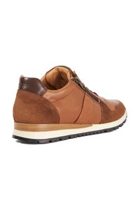 Brown leather and suede sneaker with a lace-up front, side zipper detail, and a white rubber sole. Soft textured accents on the heel.