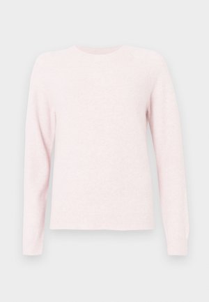 Gaiši rozā džemperis, kas izgatavots no mīksta auduma, ar apaļu kakla izgriezumu, garām raglānu piedurknēm un ribota apakšmala un piedurkņu galiem.