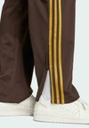 FIREBIRD  - Tracksuit bottoms - dark brown   preloved bronze