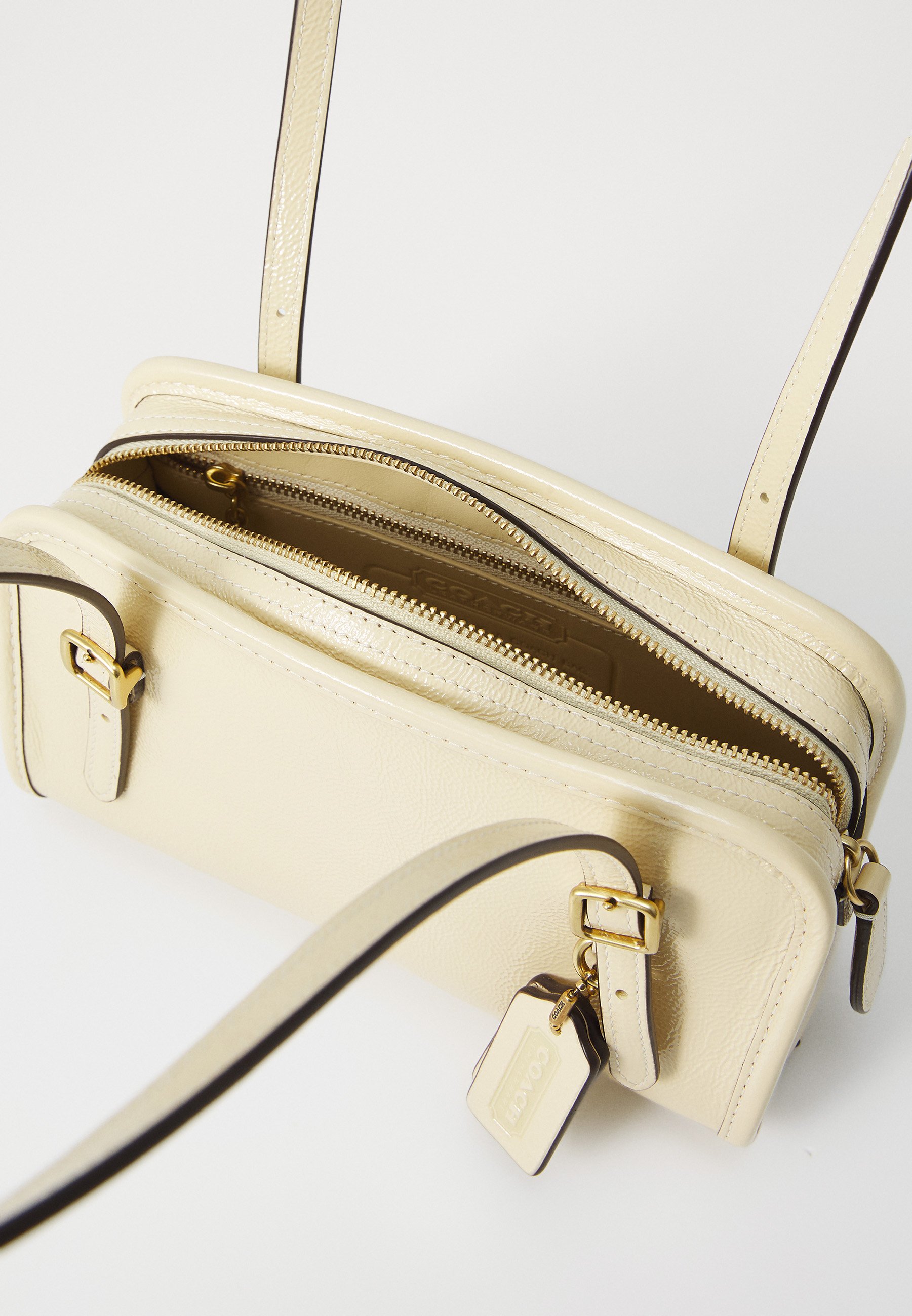 COACH SWING ZIP BAG 20 - Handbag - moonlight/light yellow