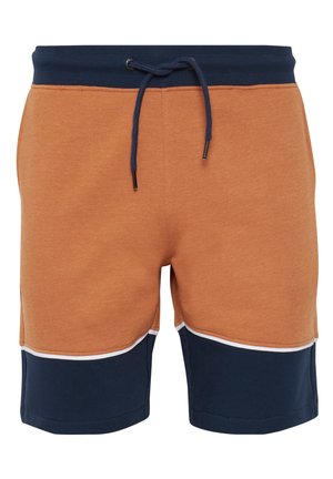 Felpa arancione con pantaloni corte, dotati di una vita elastica blu scuro e coulisse. Presenta sezioni contrastanti in blu navy e bianco all'orlo.