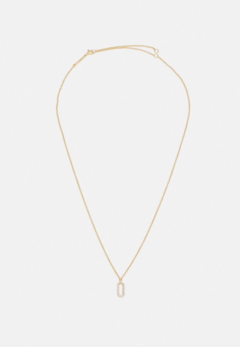 Collier délicat en chaîne d'or avec un petit pendentif ovale vertical orné de petites pierres claires sur fond blanc.