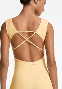 OYSHO EVERMOVE SHORT - Jumpsuit - yellow