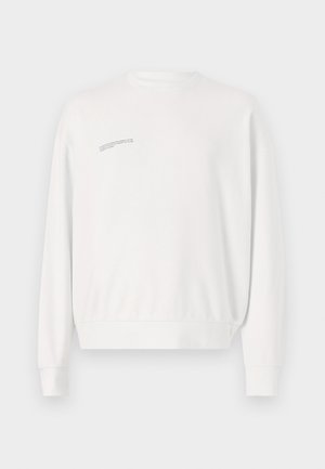 Valge dressipluus pikade varrukate, ümmarguse kaeluse ja soonikkoes äärisega. Ülemises vasakus servas on minimaalne tekst detail. Valmistatud pehmest puuvillasegust.