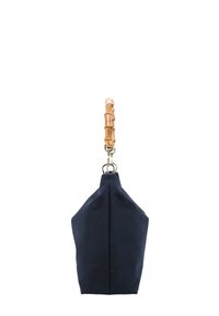 Navy fabric bag with a unique shape, featuring a bamboo handle and gold hardware. Smooth texture, structured sides, and minimalistic design.