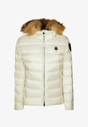Giacca a vento in crema con cappuccio in pelliccia sintetica rimovibile, zip nera, texture trapuntata e dettaglio del logo sul lato sinistro del petto.